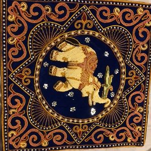 Navy blue ethnic elephant cushion cover.